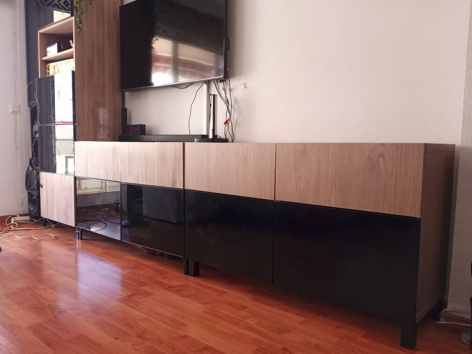 IKEA furniture after wrapping in wood and black